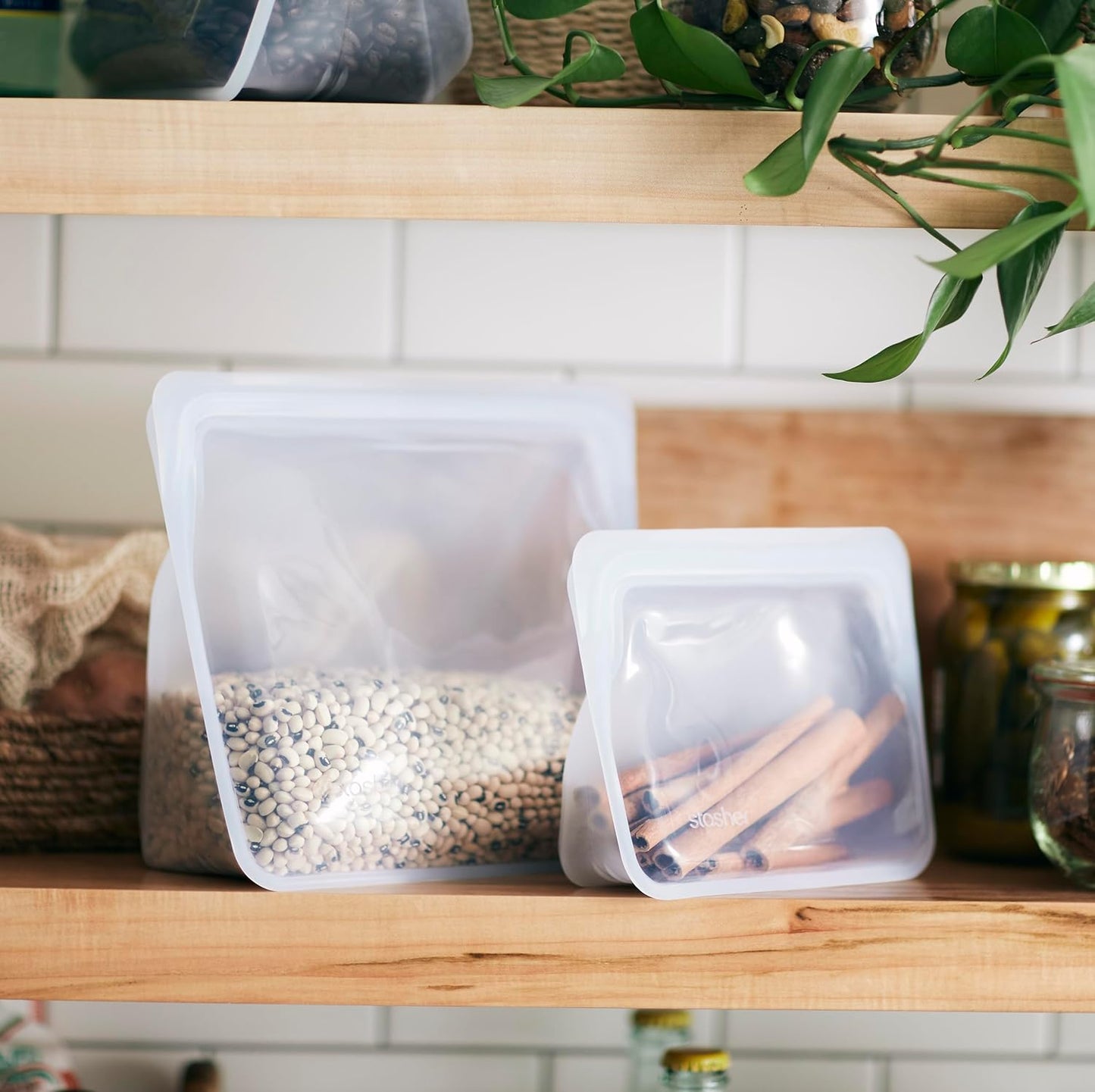 Stasher Premium Silicone Reusable Food Storage Stand-Up Mini Bag, Pink, Microwave, Sous Vide, Dishwasher, Oven and Freezer Safe, BPA Free, Leak-free, Eco-friendly, 28 Oz